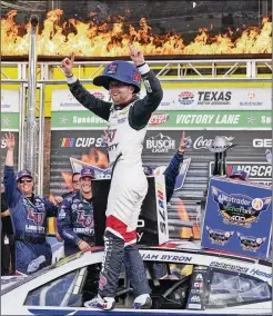  ?? LM OTERO/ASSOCIATED PRESS ?? William Byron celebrates his victory in the NASCAR Cup Series race Sunday at Texas Motor Speedway in Fort Worth. Byron, who led only the last six laps, advanced to the round of eight in the NASCAR playoffs.