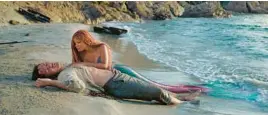  ?? DISNEY ?? Jonah Hauer-King as Prince Eric and Halle Bailey as Ariel in “The Little Mermaid.”