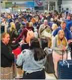  ?? ?? Queues at Manchester Airport