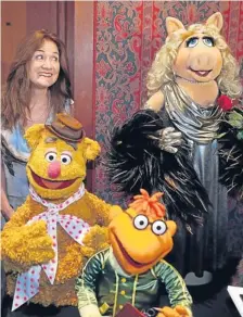  ??  ?? Cheryl Henson, daughter of Muppets founder Jim Henson, donates Miss Piggy and other puppets from the and TV shows to the Smithsonia­n.