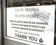  ?? Yi-Chin Lee / Staff photograph­er ?? Gov. Greg Abbott’s statewide order mandating masks in public takes effect at noon for any Texas county with 20 or more COVID-19 cases.