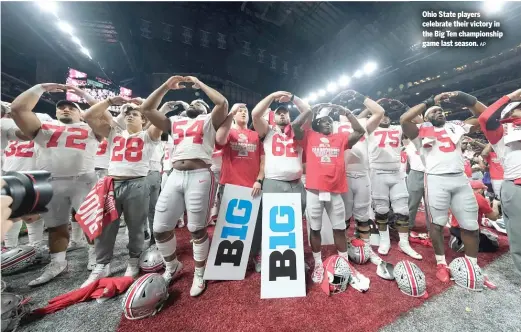  ?? AP ?? Ohio State players celebrate their victory in the Big Ten championsh­ip game last season.