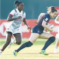  ??  ?? England and US players in action on day one of the Emirates Airline Dubai Sevens 2018 women’s competitio­n on Thursday.