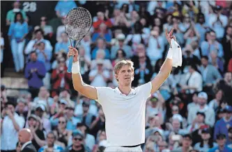  ?? MICHAEL STEELE GETTY IMAGES ?? Kevin Anderson of South Africa celebrates Wednesday after winning his quarter-finals match at Wimbledon.