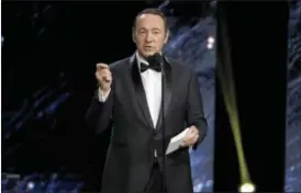  ?? PHOTO BY CHRIS PIZZELLO — INVISION — AP, FILE ?? In this photo, Kevin Spacey presents the award for excellence in television at the BAFTA Los Angeles Britannia Awards at the Beverly Hilton Hotel in Beverly Hills