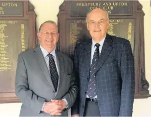  ??  ?? ●● Prestbury Golf Club’s retiring chairman Arthur Dicken (right) and Neville Young, club secretary and general manager