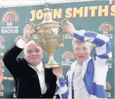  ?? ?? SIX-SHOOTER Dandy Nicholls celebrates one of his six Ayr Gold Cup triumphs with William Carson