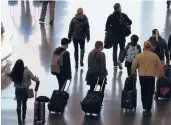  ?? RICKBOWMER/AP ?? Despite holiday travelwarn­ings, U.S. airports have seen a recent surge in passenger traffic.