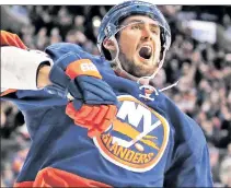  ?? AP ?? BROCK AND ROLL: Brock Nelson celebrates scoring the winning goal in overtime of the Islanders 6-5 OT win over the Maple Leafs on Monday.