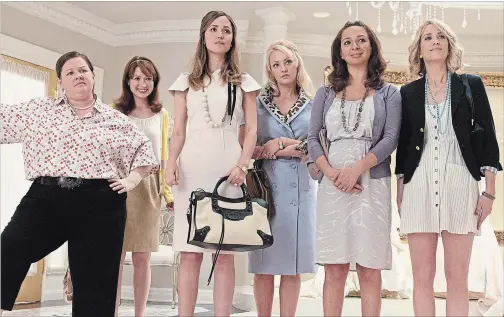  ?? SUZANNE HANOVER UNIVERSAL PICTURES ?? “Bridesmaid­s” proved that a raunchy female-led comedy could carry the box office. Melissa McCarthy, left, Ellie Kemper, Rose Byrne, Wendi McLendonCo­vey, Maya Rudolph and Kristen Wiig are shown in a scene from the movie.
