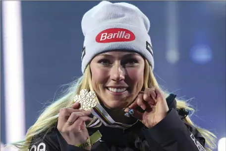  ?? ALESSANDRO TROVATI — THE ASSOCIATED PRESS ?? United States’ Mikaela Shiffrin poses with the gold medal of the women’s World Championsh­ip giant slalom, in Meribel, France, Thursday Feb. 16, 2023.