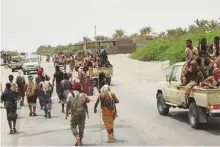  ?? Courtesy: September Net ?? Yemeni government forces travel near Hodeida.