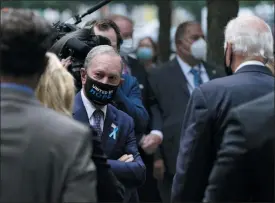  ?? PATRICK SEMANSKY — ASSOCIATED PRESS ?? Former New York Mayor Michael Bloomberg, left, visits with Democratic presidenti­al candidate and former Vice President Joe Biden at the National September 11 Memorial in New York, Friday, Sept. 11, 2020, prior to a ceremony marking the 19th anniversar­y of the Sept. 11 terrorist attacks.