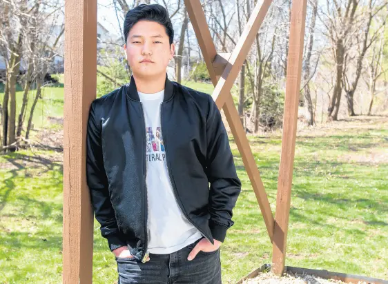  ?? ANDY LAVALLEY/POST-TRIBUNE ?? Valparaiso University engineerin­g senior Ben Kontney stands outside his apartment in Valparaiso on March 31. Kontney is president of the Asian American Pacific Islander Coalition at Valparaiso University.