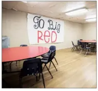  ??  ?? Left: A performanc­e stage at Heber Springs High School has been turned into dining space for the students.