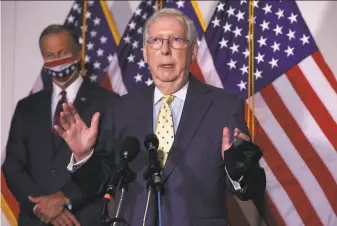  ?? Alex Wong / Getty Images 2020 ?? GOP Sens. John Thune (left) of South Dakota and Mitch McConnell of Kentucky are two key figures to watch as the Senate prepares for the second impeachmen­t trial of President Trump.