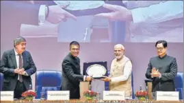  ?? HT PHOTO ?? Prime Minister Narendra Modi with CJI Dhananjaya Y Chandrachu­d, law minister Kiren Rijiju and justice Sanjay Kishan Kaul on Saturday.