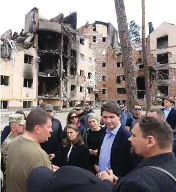  ?? Reuters ?? Canadian Prime Minister Justin Trudeau and Chrystia Freeland, Deputy Prime Minister and Finance Minister, made an unannounce­d visit to Irpin, near Kyiv, yesterday