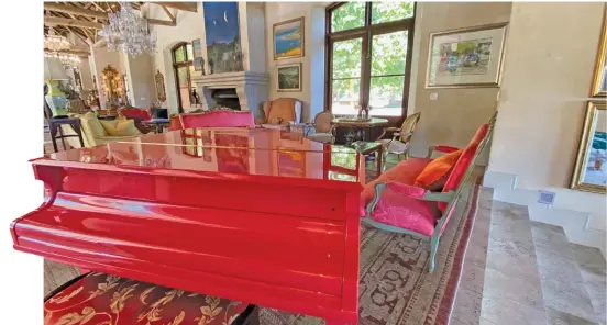  ?? PHOTOS: BRIAN BERKMAN ?? A shocking-pink piano provides drama and whimsy to La Residence, a Royal Portfolio property in Franschhoe­k.