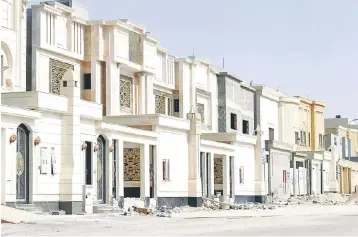  ??  ?? Newly constructe­d private villas are seen near Riyadh, Saudi Arabia. — Reuters photo