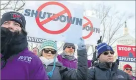  ?? REUTERS ?? Air traffic controller union members protest the US government shutdown during a rally at the US Capitol in Washington.