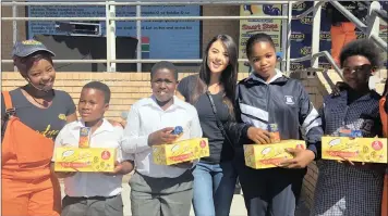  ??  ?? TV presenter Lalla Hiramiya and the Clover Krush Goodness crew visited Intshayele­lo Primary School in Ilitha Park in Khayelitsh­a and Mokone Primary School in Langa to donate school shoes.