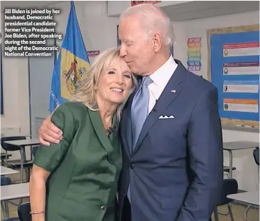  ??  ?? Jill Biden is joined by her husband, Democratic presidenti­al candidate former Vice President Joe Biden, after speaking during the second night of the Democratic National Convention