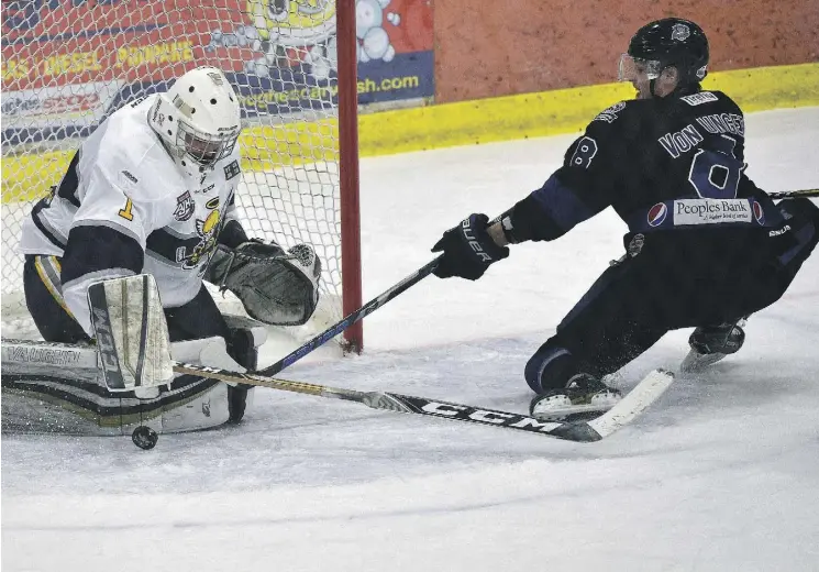  ?? ED KAISER ?? Spruce Grove Saints goalie Nolan Kent stops Wenatchee Wild player August Von Ungern but the Wild still scored a 4-3 win in Game 3 of the Doyle Cup Tuesday at Grant Fuhr Arena.
