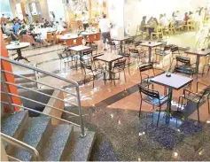  ??  ?? An eatery at City Mall was also flooded.