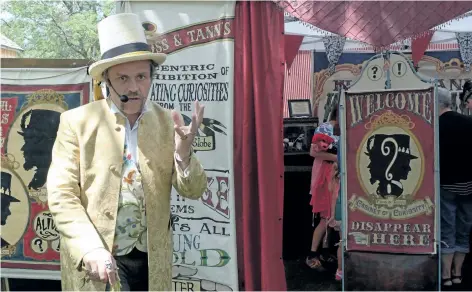  ?? MICHELLE ALLENBERG/WELLAND TRIBUNE ?? Karl Thurston-Brown of Mental Floss Sideshow's Cabinet of Curiosity for the Incurably Curious is pictured in front of a tent at Port Colborne Historical and Marine Museum during Canal Days Saturday.