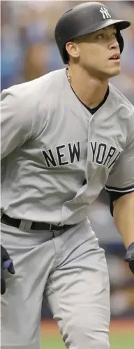  ?? (Photo by Chris O'Meara, AP) ?? New York Yankees' Aaron Judge watches his home run off Tampa Bay Rays starting pitcher Matt Andriese during an earlier game this season.