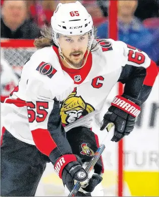  ?? AP PHOTO ?? Ottawa Senators’ Erik Karlsson moves the puck against the Carolina Hurricanes during an NHL game in Raleigh, N.C., on Jan. 30.