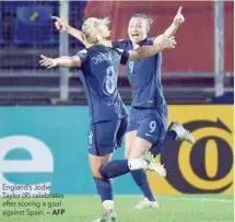  ?? — AFP ?? England’s Jodie Taylor (R) celebrates after scoring a goal against Spain.