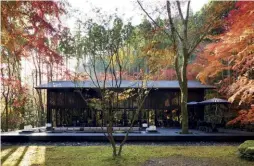  ??  ?? Previous page — Two Presidenti­al Suites are located on higher platforms on the property, overlookin­g the forest canopy.
Left — The architectu­re of Aman Kyoto is visually simple and minimalist to allow nature and landscape to dominate. The Living Pavilion forms the social hub of the property, and opens onto a large timber dining terrace with sunken fire pit.
Right — On arrival, guests first enter the reception. Aman Kyoto is located within an establishe­d 3.2-hectare garden setting surrounded by mature forests on the outskirts of Kyoto.