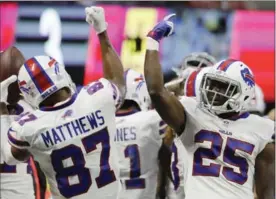  ?? DAVID GOLDMAN, THE ASSOCIATED PRESS ?? The Buffalo Bills have shown unexpected signs of being a close-knit group in getting off to a better-than-expected 3-2 start entering their bye week.