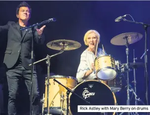  ??  ?? Rick Astley with Mary Berry on drums