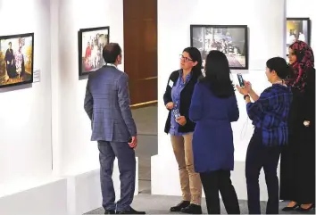  ?? Arshad Ali/Gulf News ?? Photo exhibition titled ‘Pakistan Behind the Headlines’, featuring images taken by Sa’adia Khan, puts the spotlight on the ‘forgotten people’ living in the refugee camps and those internally displaced due to conflicts in various regions of Pakistan.