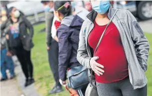  ?? CHARLES KRUPA THE ASSOCIATED PRESS FILE PHOTO ?? A 2020 survey by clinicians at Unity Health Toronto found that 69 per cent of pregnant women and new mothers reported moderate to high levels of distress last spring.