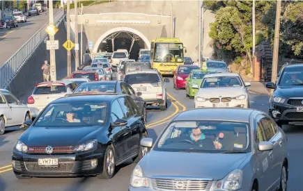  ?? Photo / Mark Mitchell ?? Congestion in Wellington (pictured), delayed transport projects in Auckland — the list of problems is growing.