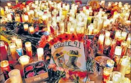  ?? REUTERS ?? A candleligh­t vigil is seen on Monday at the Las Vegas strip following the shooting.