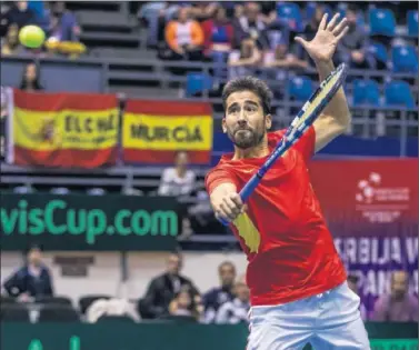  ??  ?? ADIÓS. Marc López, durante el dobles de Copa Davis el pasado sábado en Serbia, donde España perdió.