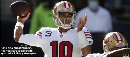  ?? AP FILE ?? ‘HELL OF A QUARTERBAC­K’: The 49ers are sticking with quarterbac­k Jimmy Garoppolo.