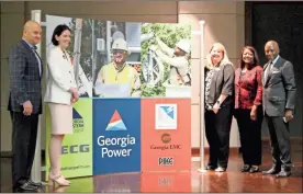  ?? Jeremy stewart ?? Representa­tives from Georgia Northweste­rn Technical College, Alabama Power and Georgia Power pose for a photo after signing an MOU establishi­ng the new electrical lineworker program at the GNTC Polk County Campus in Rockmart on Monday, April 18.