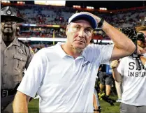  ?? MONICA HERNDON / TAMPA BAY TIMES ?? Florida coach Dan Mullen leaves the field Saturday after a 27-16 loss to visiting Kentucky. It was the Gators’ first home loss in the series since Jimmy Carter was president.