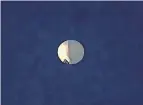  ?? LARRY MAYER/THE BILLINGS GAZETTE VIA AP ?? The high-altitude balloon floats over Billings, Mont., on Wednesday.