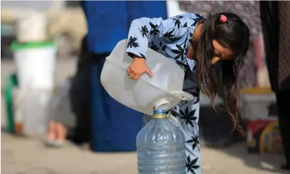  ?? Photograph: Anadolu/Getty Images ?? The UN world water developmen­t report found that women and girls are often responsibl­e for water collection – and water access is a key issue in the conflict in Gaza.