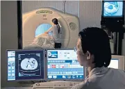  ?? WISIT THAMNGERN ?? An MRI scan at Bumrungrad Hospital, one of the main hospitals treating foreigners.