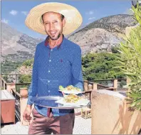  ?? STEVE MACNAULL PHOTO ?? Lunch arrives on the rooftop terrace at Kasbah du Toubkal, a National Geographic Unique Lodges of the World in the Atlas Mountains.