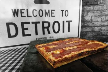  ?? FILE P PHOTOS ?? Buddy’s Pizza, the creator of the Original Detroit-Style Pizza, hosted the official opening of its 22nd location at Gratiot Avenue and 23Mile Road in Chesterfie­ld Township in 2022.