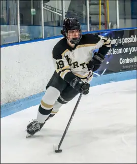  ?? Staff Photo ?? North Kingstown’s Ronan Gately controls the puck during in 2022 at Boss Arena.
